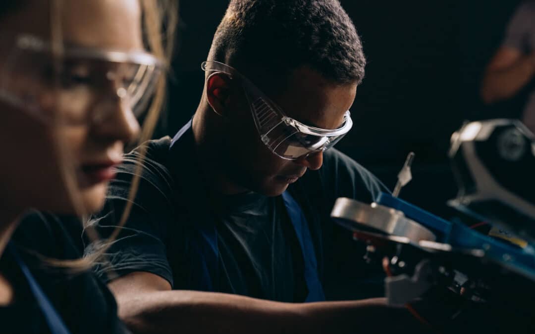 Metal Manufacturers Working In A Factory