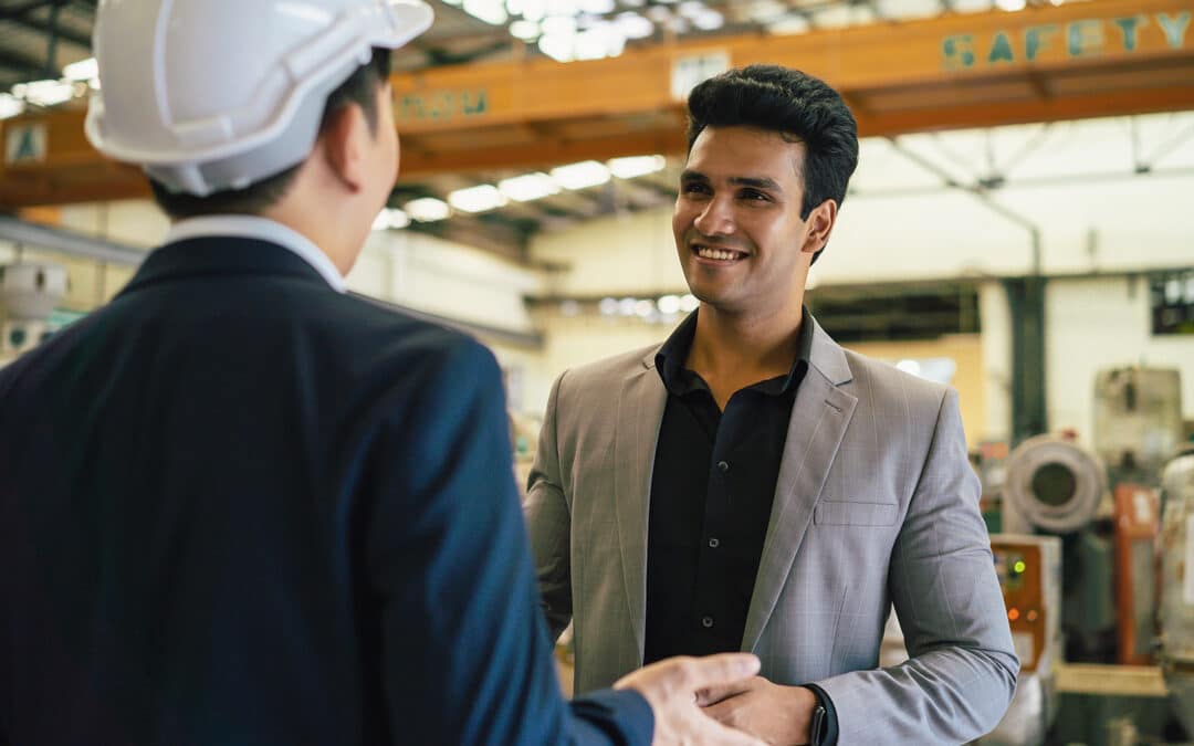 Two People Making A Deal In Manufacturing