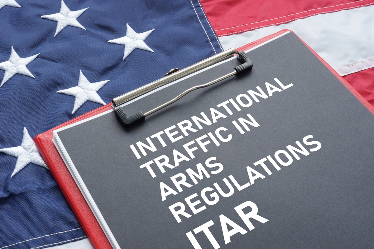 Itar On A Clipboard Over An American Flag